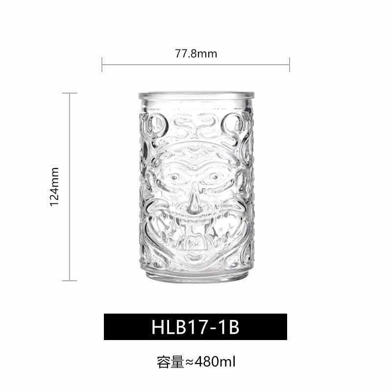 Transparent drinkware featuring unique embossed face designs in six cylindrical glass mugs.