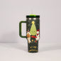 Christmas pattern mug with festive reindeer design and green handle, perfect for holiday beverages.