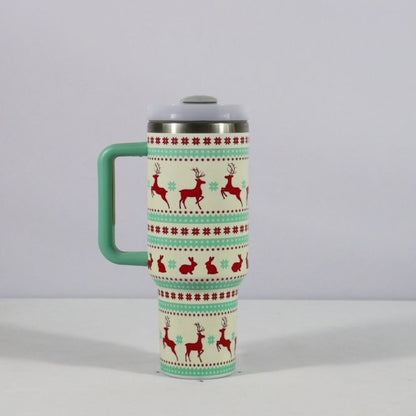 Christmas pattern mug with festive reindeer design and green handle, perfect for holiday beverages.