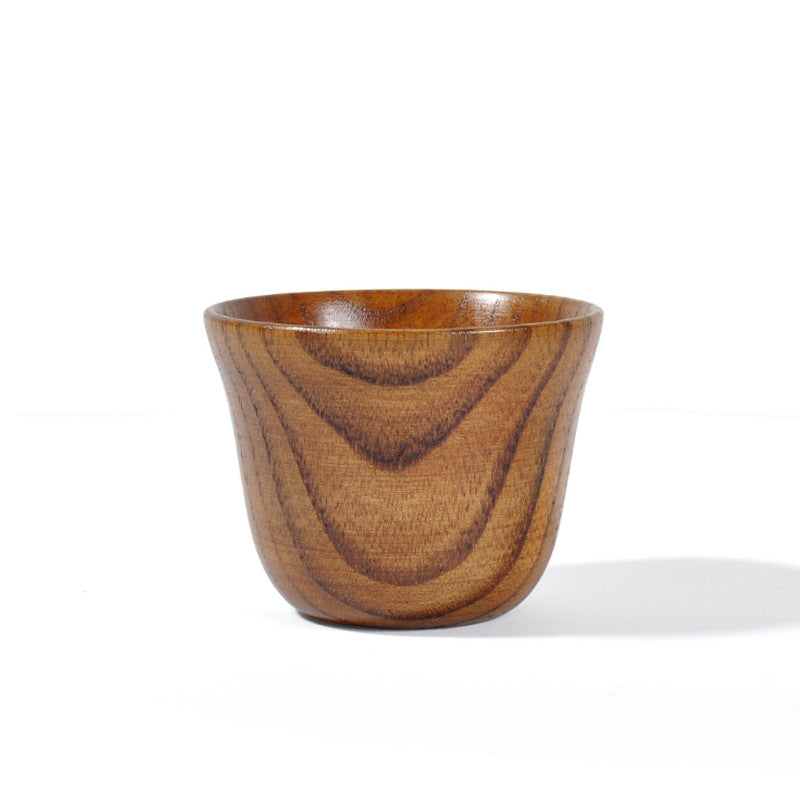 handmade wooden cup - handcrafted spruce wooden cup with smooth surface and elegant design.