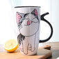Cute cartoon ceramic cat mug with large capacity, perfect for coffee lovers and adding charm to drinkware.