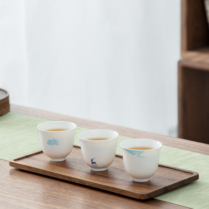 Chinese tea bowl with floral design, showcasing elegant craftsmanship in ceramic drinkware.