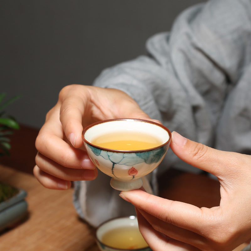 Chinese tea bowl with floral design, showcasing elegant craftsmanship in ceramic drinkware.
