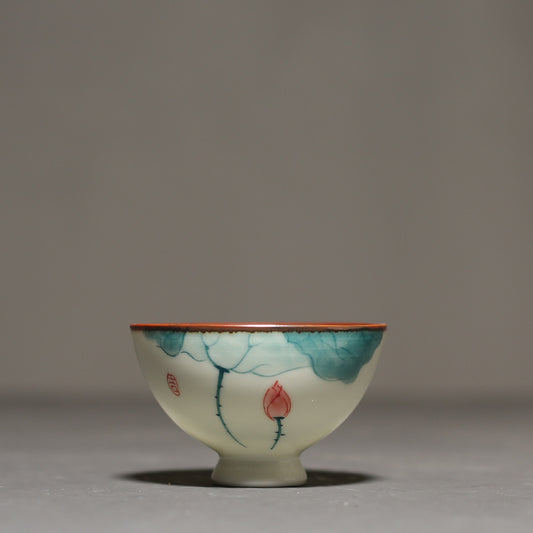 Chinese tea bowl with floral design, showcasing elegant craftsmanship in ceramic drinkware.