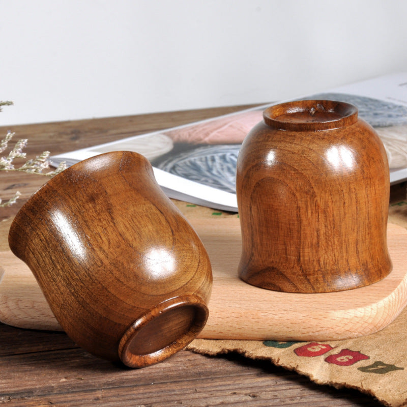 handmade wooden cup - handcrafted spruce wooden cup with smooth surface and elegant design.