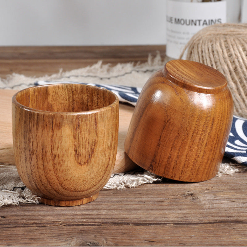 handmade wooden cup - handcrafted spruce wooden cup with smooth surface and elegant design.