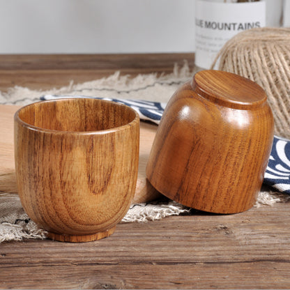 handmade wooden cup - handcrafted spruce wooden cup with smooth surface and elegant design.
