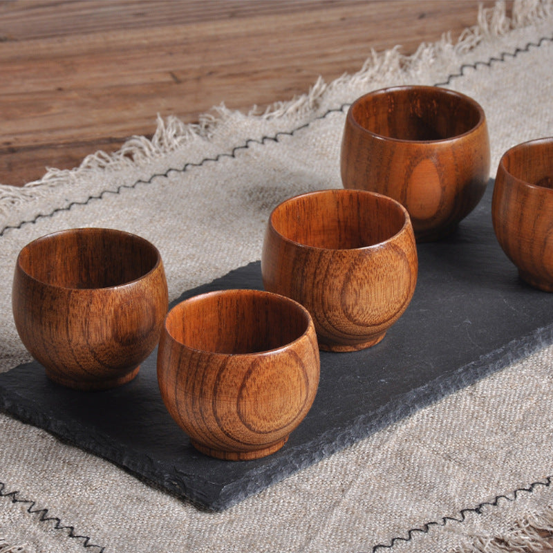 handmade wooden cup - handcrafted spruce wooden cup with smooth surface and elegant design.