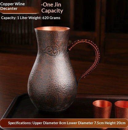 Purple liquor pot with hammered copper finish and elegant handle, ideal for serving wine and spirits.