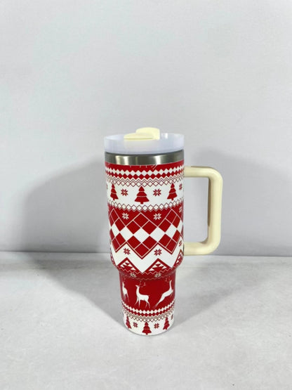 Christmas pattern mug with festive reindeer design and green handle, perfect for holiday beverages.