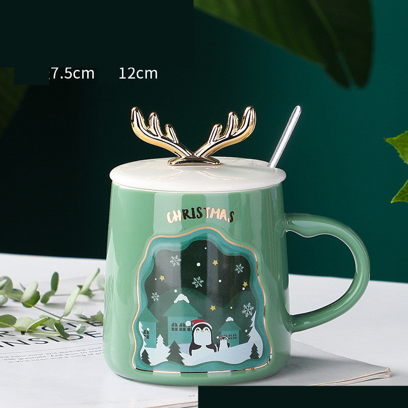 easy grip coffee mug set in festive Christmas colors with decorative antlers, perfect for holiday beverages.