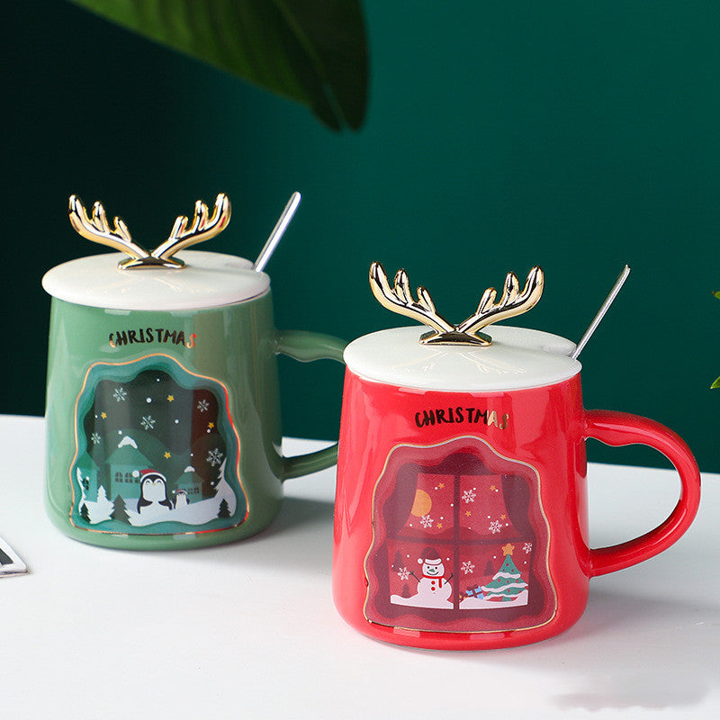 easy grip coffee mug set in festive Christmas colors with decorative antlers, perfect for holiday beverages.