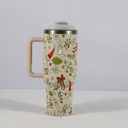 Christmas pattern mug with festive reindeer design and green handle, perfect for holiday beverages.