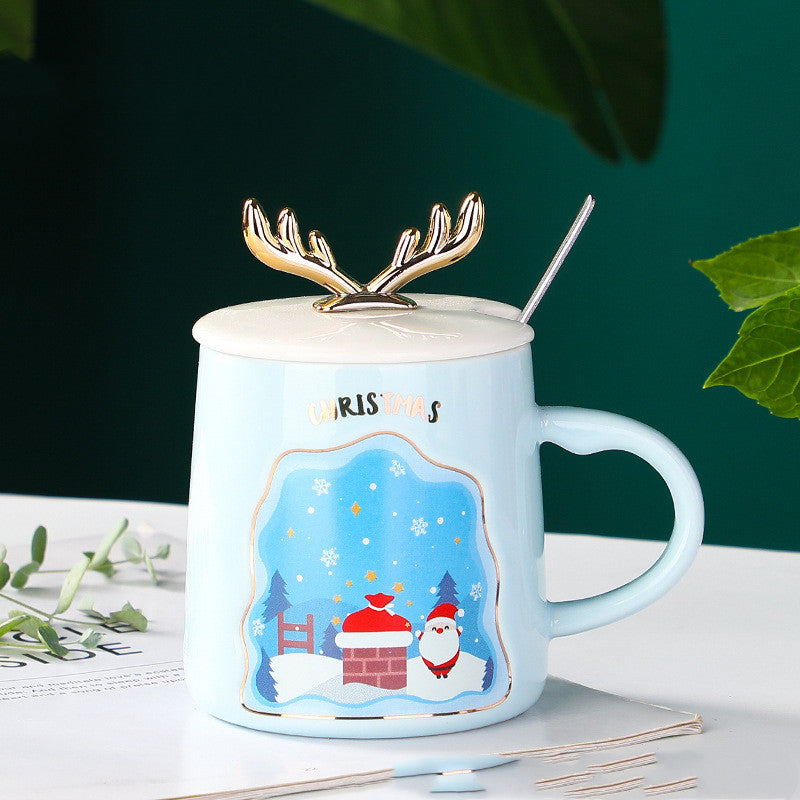 easy grip coffee mug set in festive Christmas colors with decorative antlers, perfect for holiday beverages.