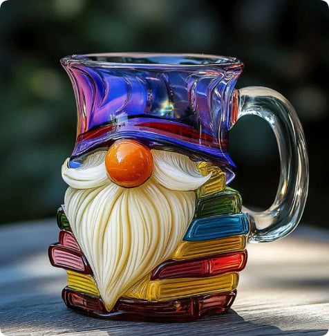 Book shaped glass mug featuring a colorful 3D design resembling a stack of illustrated books.