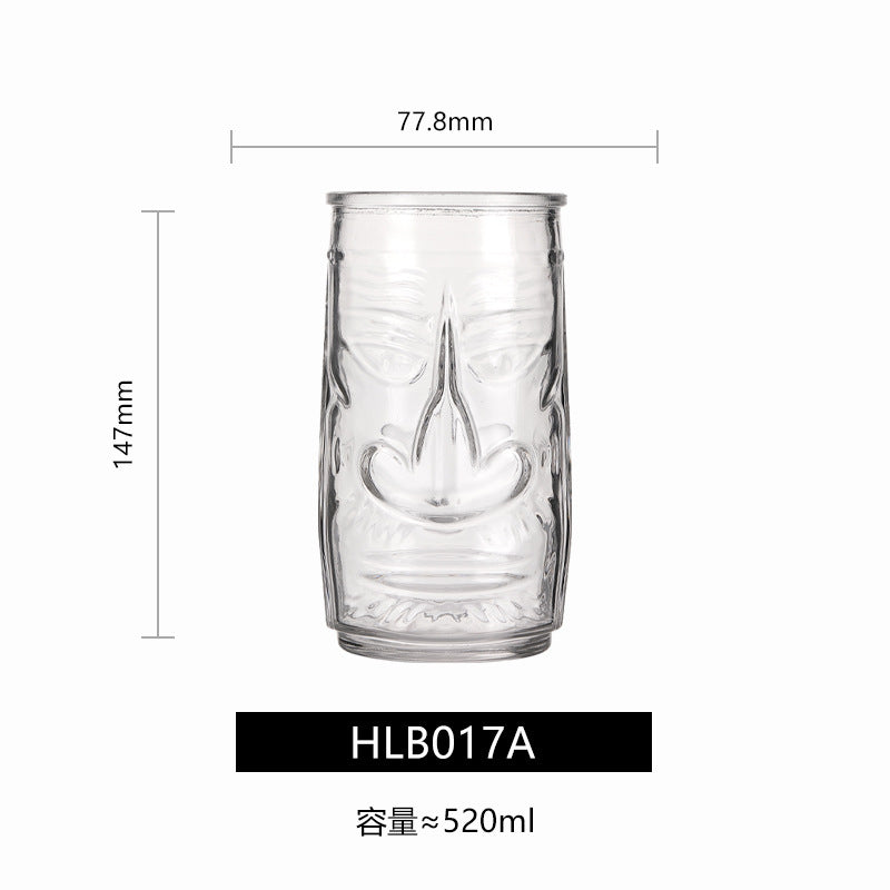 Transparent drinkware featuring unique embossed face designs in six cylindrical glass mugs.