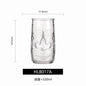 Transparent drinkware featuring unique embossed face designs in six cylindrical glass mugs.