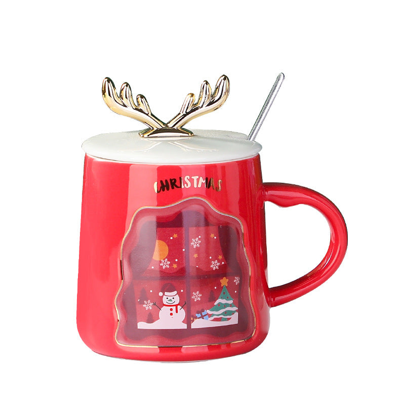 easy grip coffee mug set in festive Christmas colors with decorative antlers, perfect for holiday beverages.