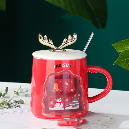 easy grip coffee mug set in festive Christmas colors with decorative antlers, perfect for holiday beverages.