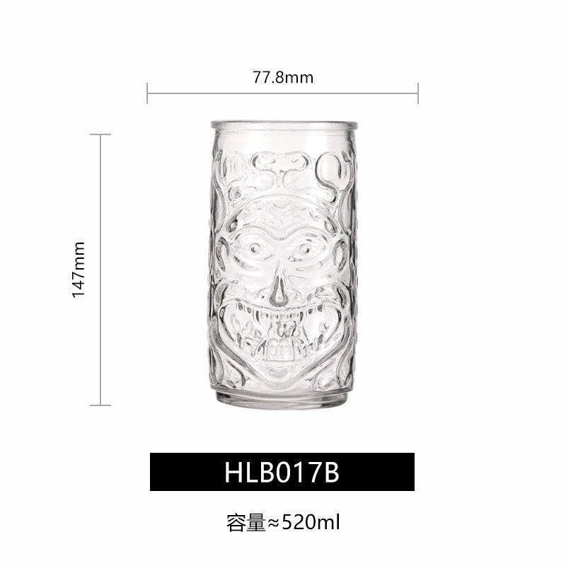 Transparent drinkware featuring unique embossed face designs in six cylindrical glass mugs.