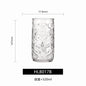 Transparent drinkware featuring unique embossed face designs in six cylindrical glass mugs.